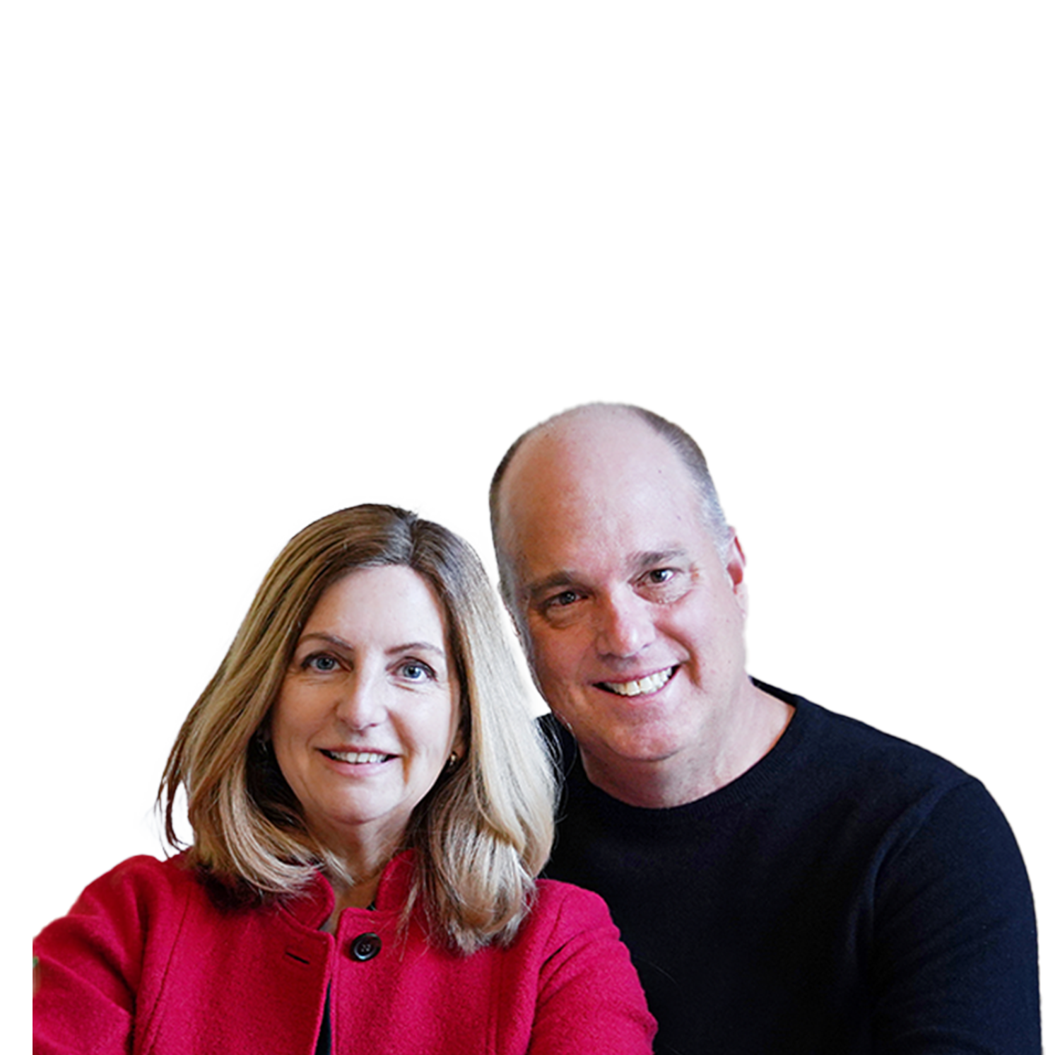 Portrait of a smiling middle-aged couple, woman with shoulder-length blonde hair wearing a red blazer, man with short hair and a bald head wearing a black top.